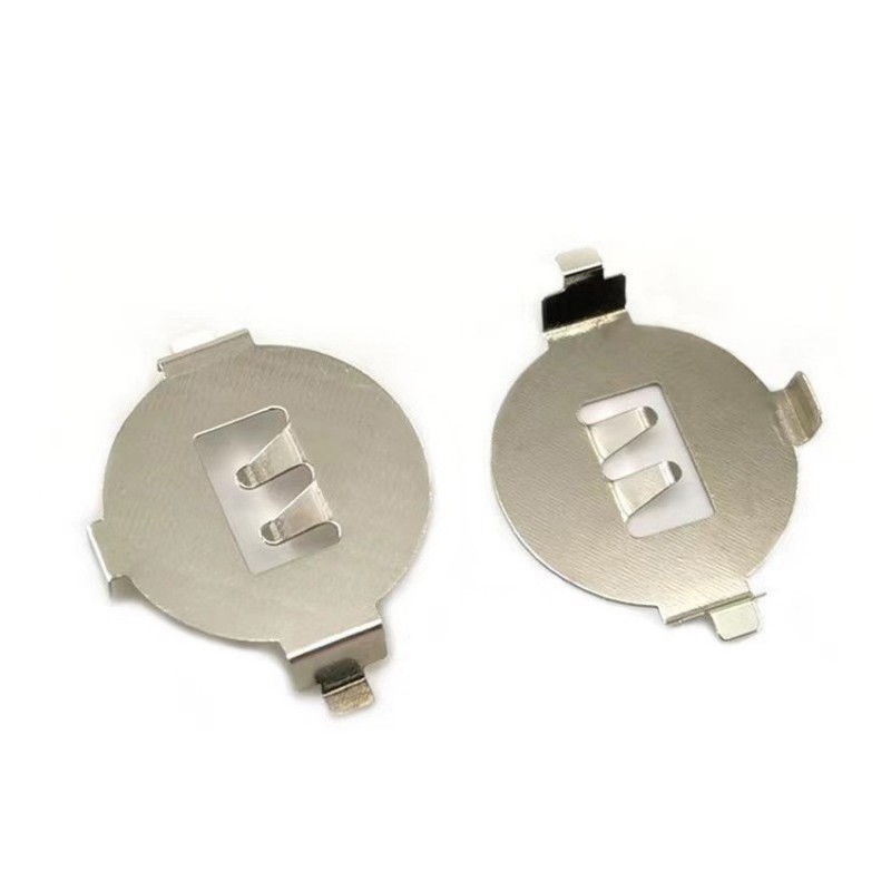 Boucle d'accueil de batterie de bouton